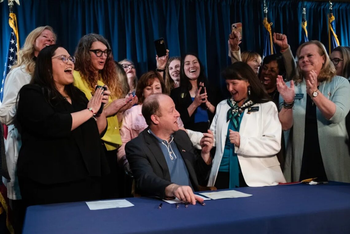 Colorado governor signs three bills further protecting access to abortion, gender-affirming care into law. Here’s what they do.